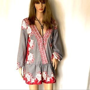 Unusual dress with dropped waist and oriental design